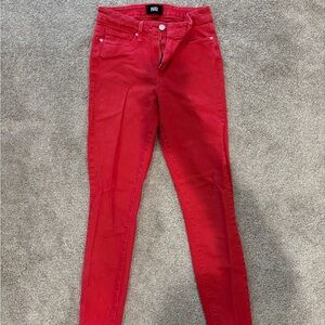 Paige denim. Red color with raw hem. Size 25.